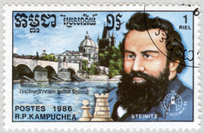 Estampilla: Wilhelm Steinitz. Puente Carlos, Praga. Stockholmia 86. República Popular de Kampuchea 1986.
